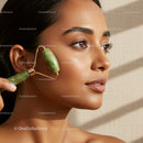 Elegant Woman Using Jade Roller for Skincare and Facial Massage
