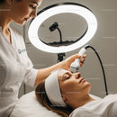 Professional Facial Treatment Using Advanced Skincare Equipment in a Modern Clinic