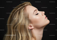 Profile of serene young woman with closed eyes