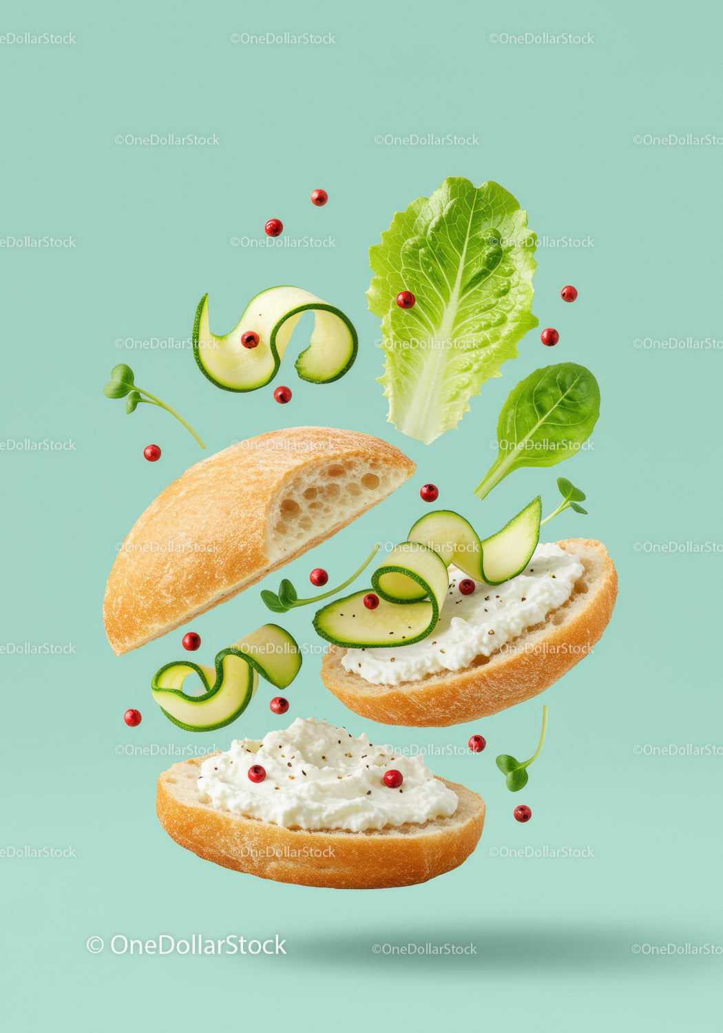 Fresh sandwich ingredients floating with creamy spread
