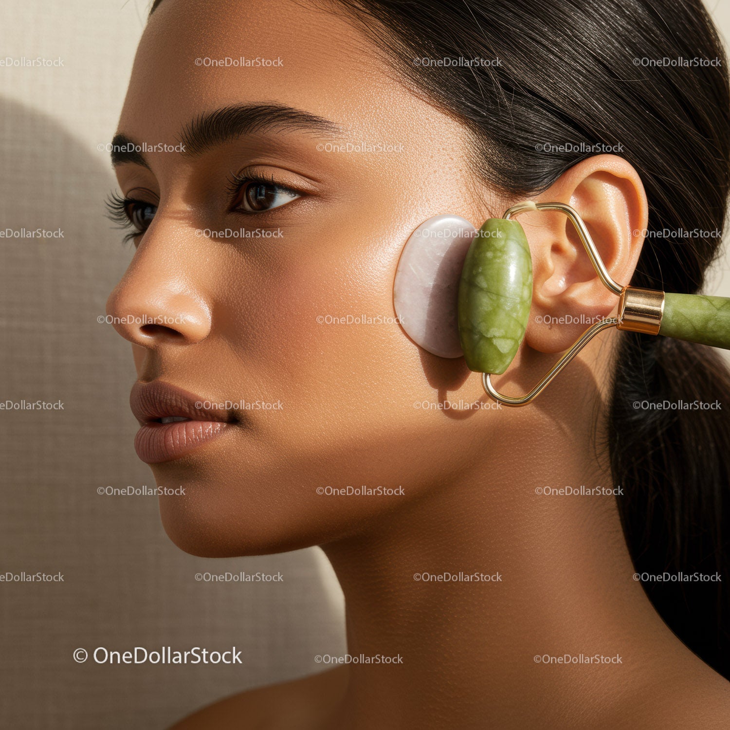 Woman Using Jade Roller for Face Massage and Skin Rejuvenation