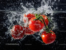 Juicy Red Cherry Tomatoes Splashing in Water for Freshness