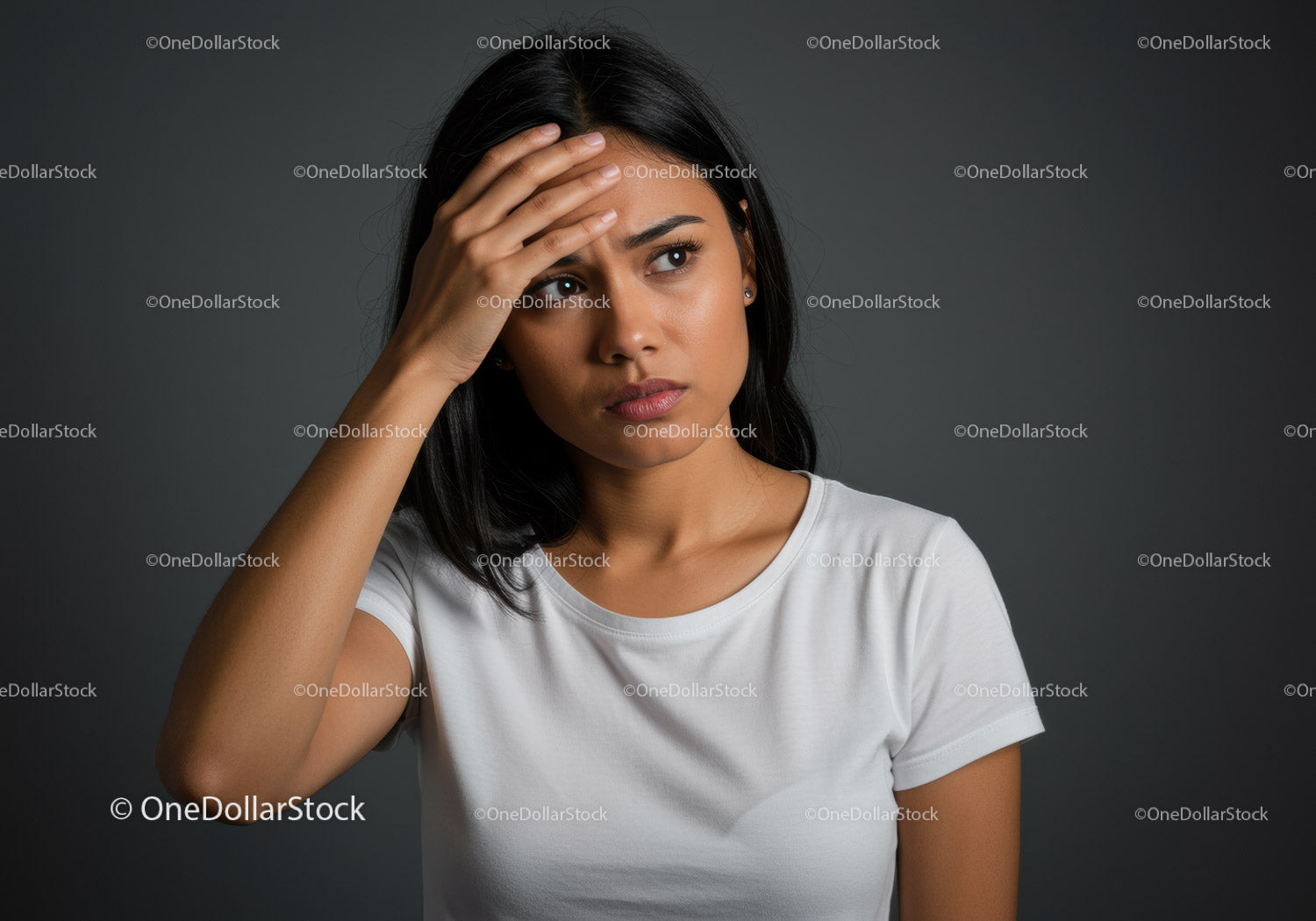 Contemplative Young Woman with Thoughtful Expression in Studio