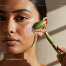 Close-up of a Woman Using a Jade Face Roller for Skin Rejuvenation