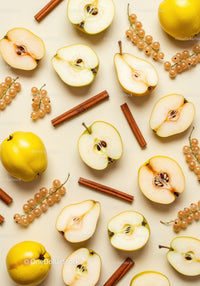 Fresh quince fruit and cinnamon sticks with white currants
