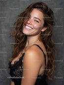 Confident Smiling Woman with Long Wavy Hair and Black Lace Lingerie