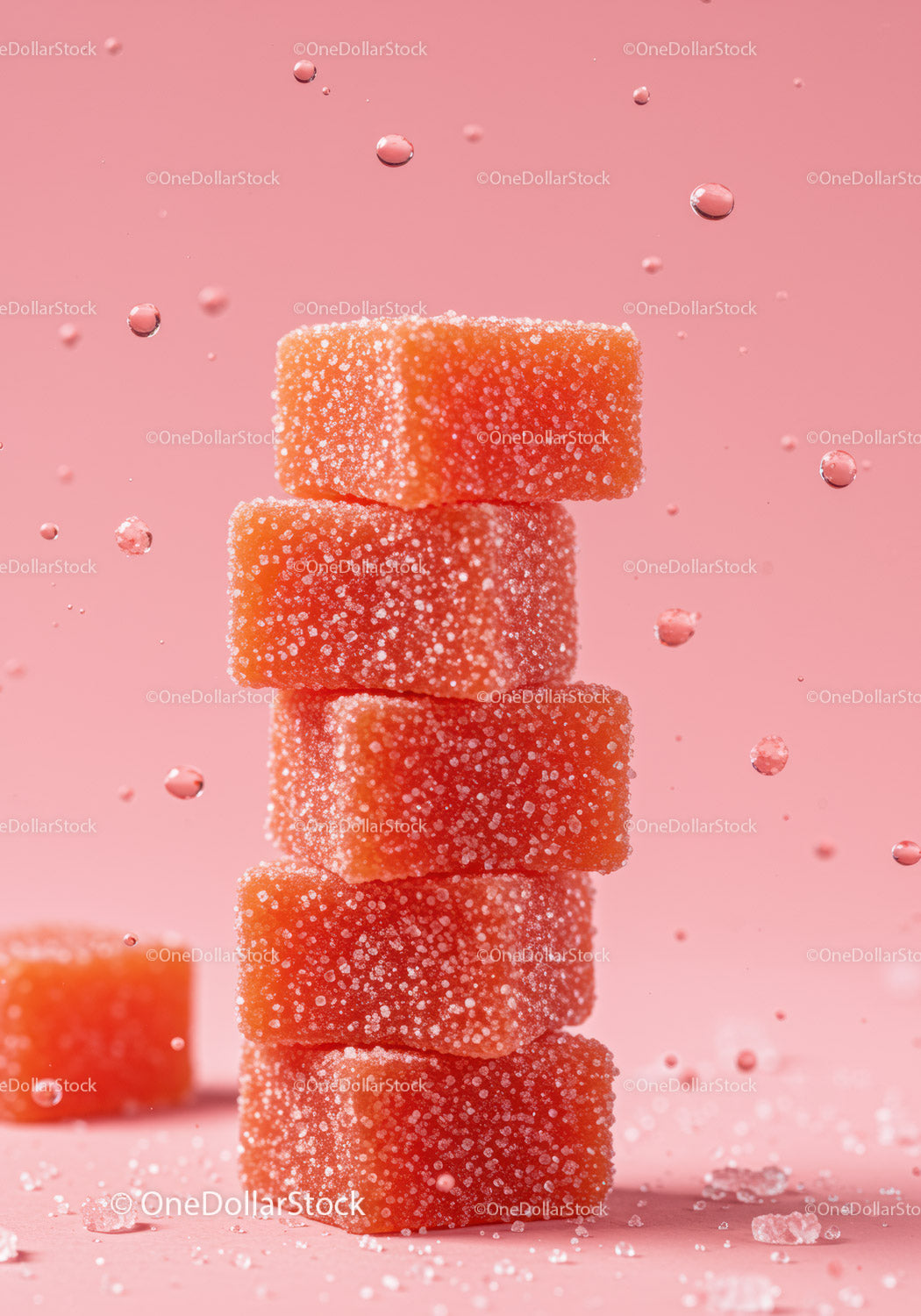 Stos pomarańczowych galaretek w cukrowej otoczce