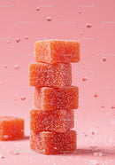 Stack of sugar-coated orange jelly candy cubes