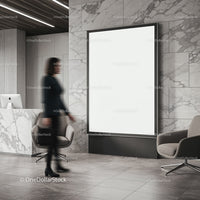 Modern office lobby with blank advertisement poster