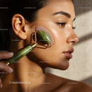 Close-up of a woman receiving facial massage with jade roller