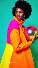 Vibrant Fashion Portrait of Black Woman with Disco Ball in Studio