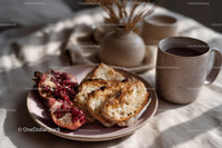 Healthy Breakfast with Pomegranate Toast and Coffee in Cozy Setting