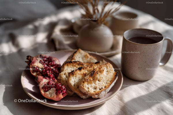 Healthy Breakfast with Pomegranate Toast and Coffee in Cozy Setting