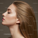 Profile of young woman with smooth glowing skin and hair