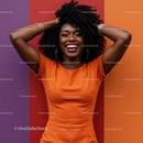 Vibrant Happy Woman in Orange Dress with Curly Hair Against Colorful Wall