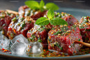 Spicy Grilled Meatballs on Skewers with Herbs and Ice