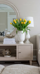 Yellow Tulips in White Vase Decorate Modern Living Room Interior