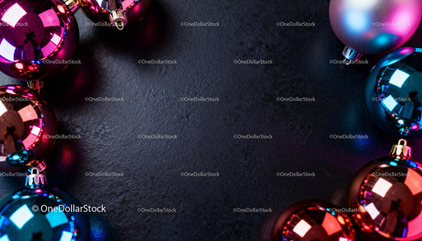 Colorful Christmas Ornaments Framing Dark Textured Background