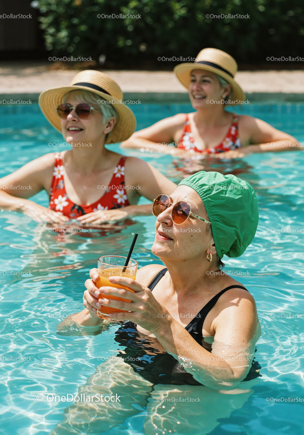 Elderly Women Relaxing and Drinking Refreshing Drinks in Pool