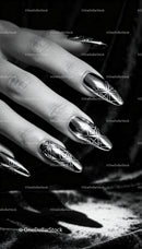 Close-up of hand with shiny geometric nail art