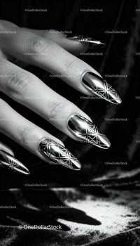 Close-up of hand with shiny geometric nail art