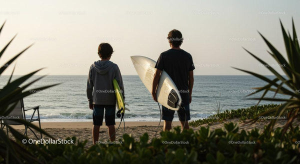 Casual Friends with Surfboards Watching Sunset at the Beach
