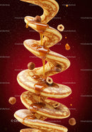 Spiral Stack of Pancakes with Honey and Hazelnuts