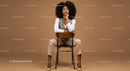Stylish Confident Woman Sitting on Chair in Modern Studio