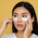 Young Woman Applying Eye Patches for Skin Care Routine