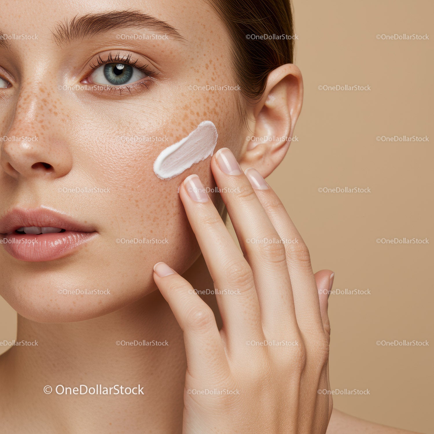 Close-Up of Woman Applying Face Cream for Glowing Skin