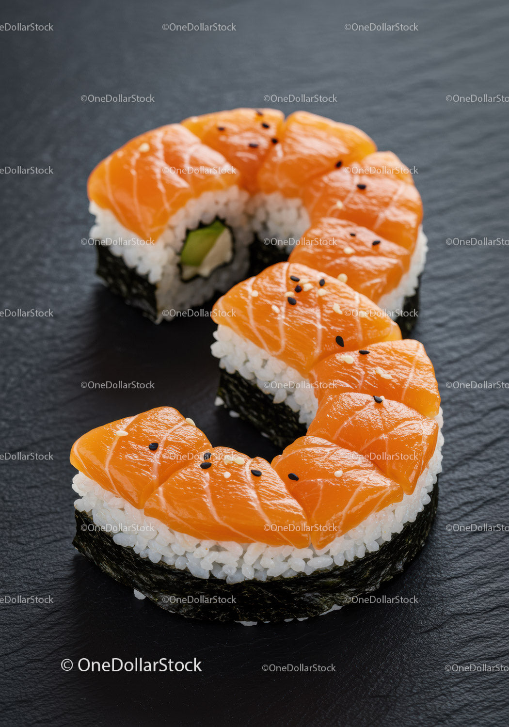 Salmon sushi pieces arranged in number three shape
