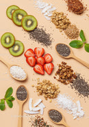 Fresh sliced kiwi and strawberry with superfood toppings
