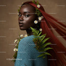 Elegant Portrait of a Woman with Flowing Red Hair and Botanical Accessories