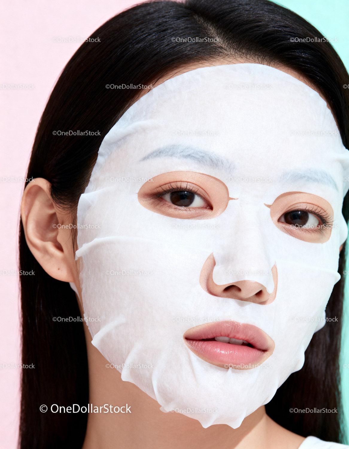 Young woman enjoying hydrating sheet mask skincare ritual
