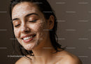 Smiling Woman with Soap Foam on Face During Skincare Routine