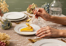 Elegant Lemon Tart Dessert on Fine Dining Table with Floral Decor