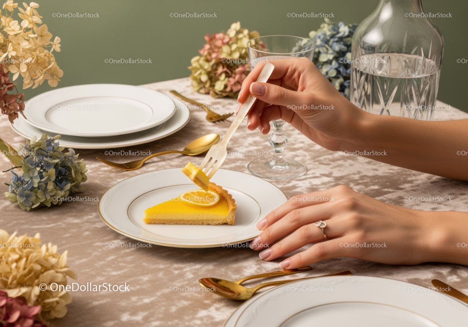 Elegant Lemon Tart Dessert on Fine Dining Table with Floral Decor