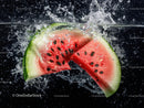 Juicy Watermelon Slice Splashing into Water