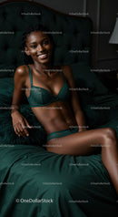 Smiling woman relaxing on green bed in lace lingerie