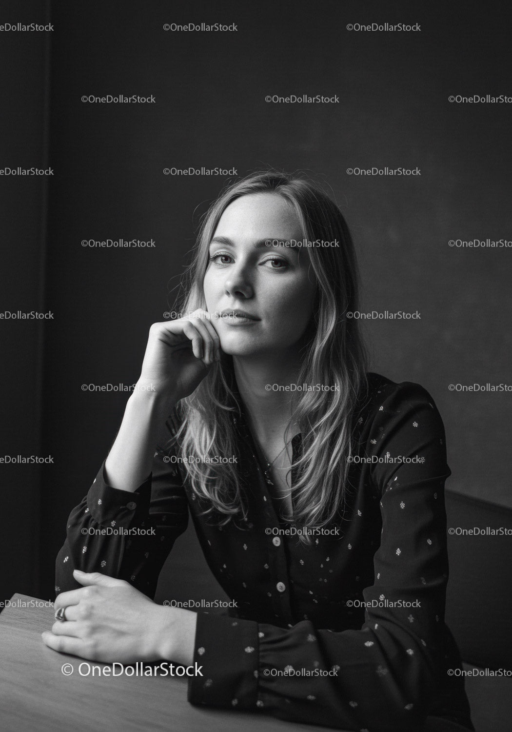 Elegant Woman in Black and White Studio Portrait