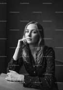 Elegant Woman in Black and White Studio Portrait