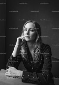 Elegant Woman in Black and White Studio Portrait