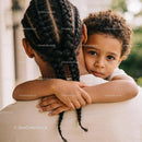 Young child embracing parent with trusting gaze