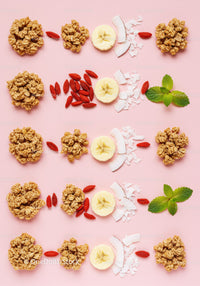 Healthy snack arrangement with granola, banana, and coconut