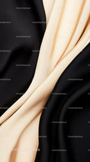 Elegant Black and Cream Satin Fabric Close-Up with Flowing Texture