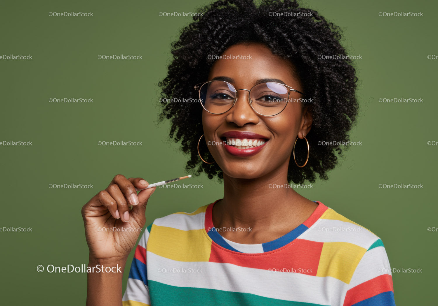 Smiling woman with glasses holding cotton swab in vibrant casual outfit