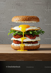 Gourmet sandwich with fried eggs and sun dried tomatoes