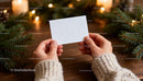 Person Holding Blank Card with Christmas Decor Background JPG Mockup Image preview