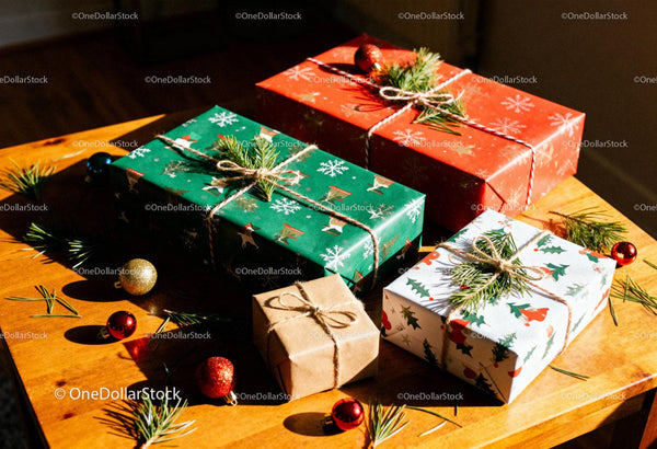 Festive wrapped Christmas gifts with natural decorations