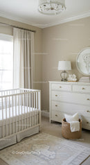 Elegant White Nursery with Crib and Cozy Decor in Neutral Tones